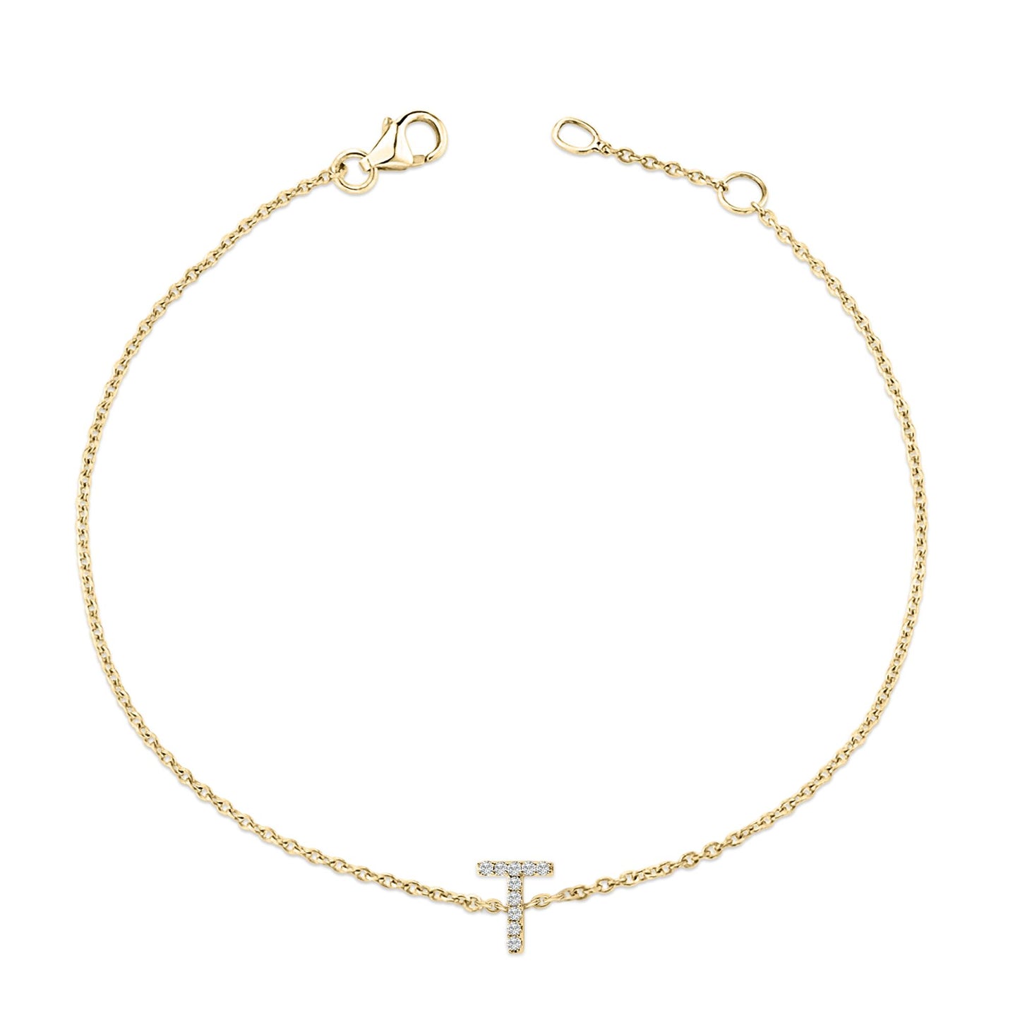 Yellow bracelet with a small T-shaped charm set with round white gemstones in a micro-pave setting, shown flat on a white background from a top-down angle.