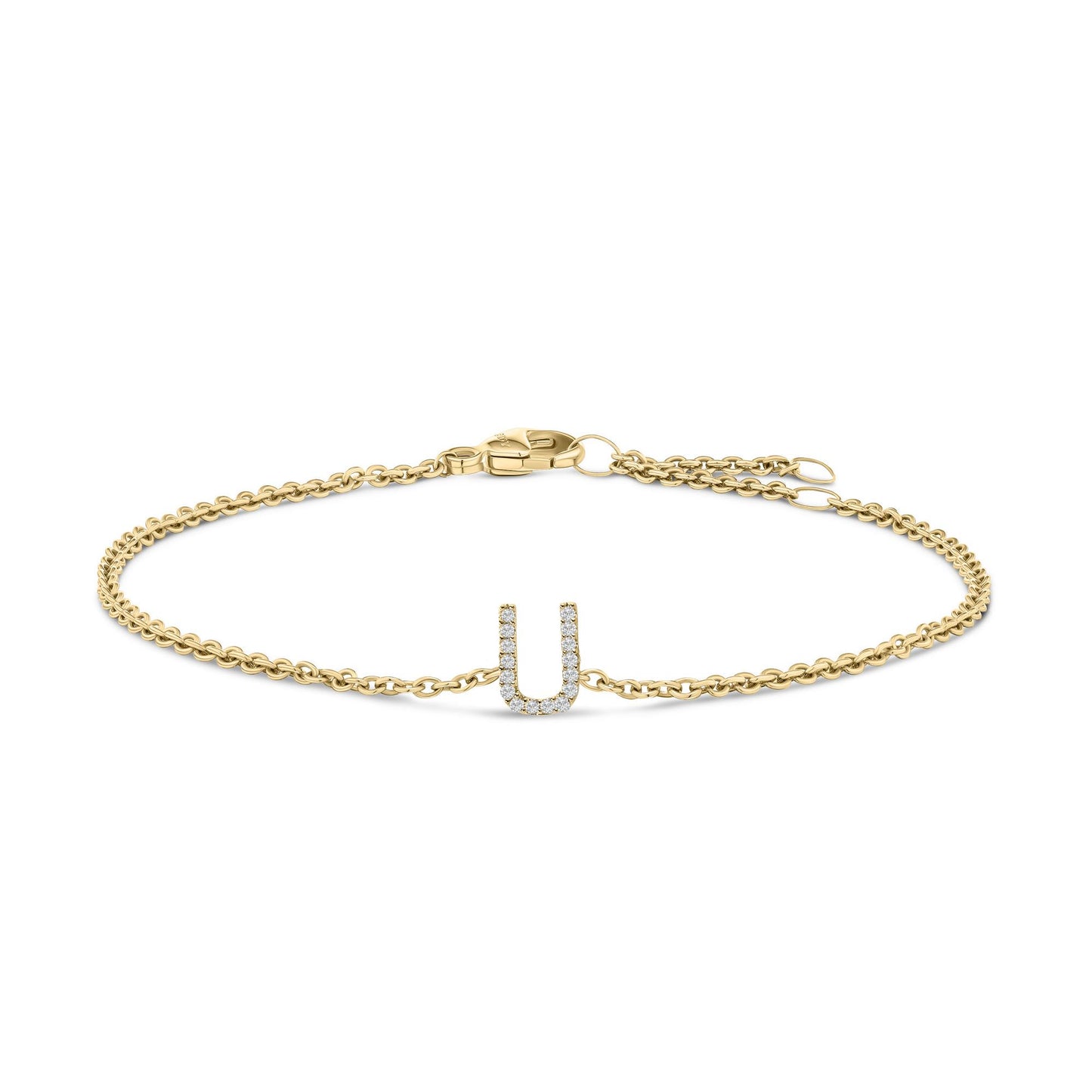 Yellow metal bracelet with a U-shaped charm set with white round gemstones in a micro-pave setting, shown flat from a top angle.