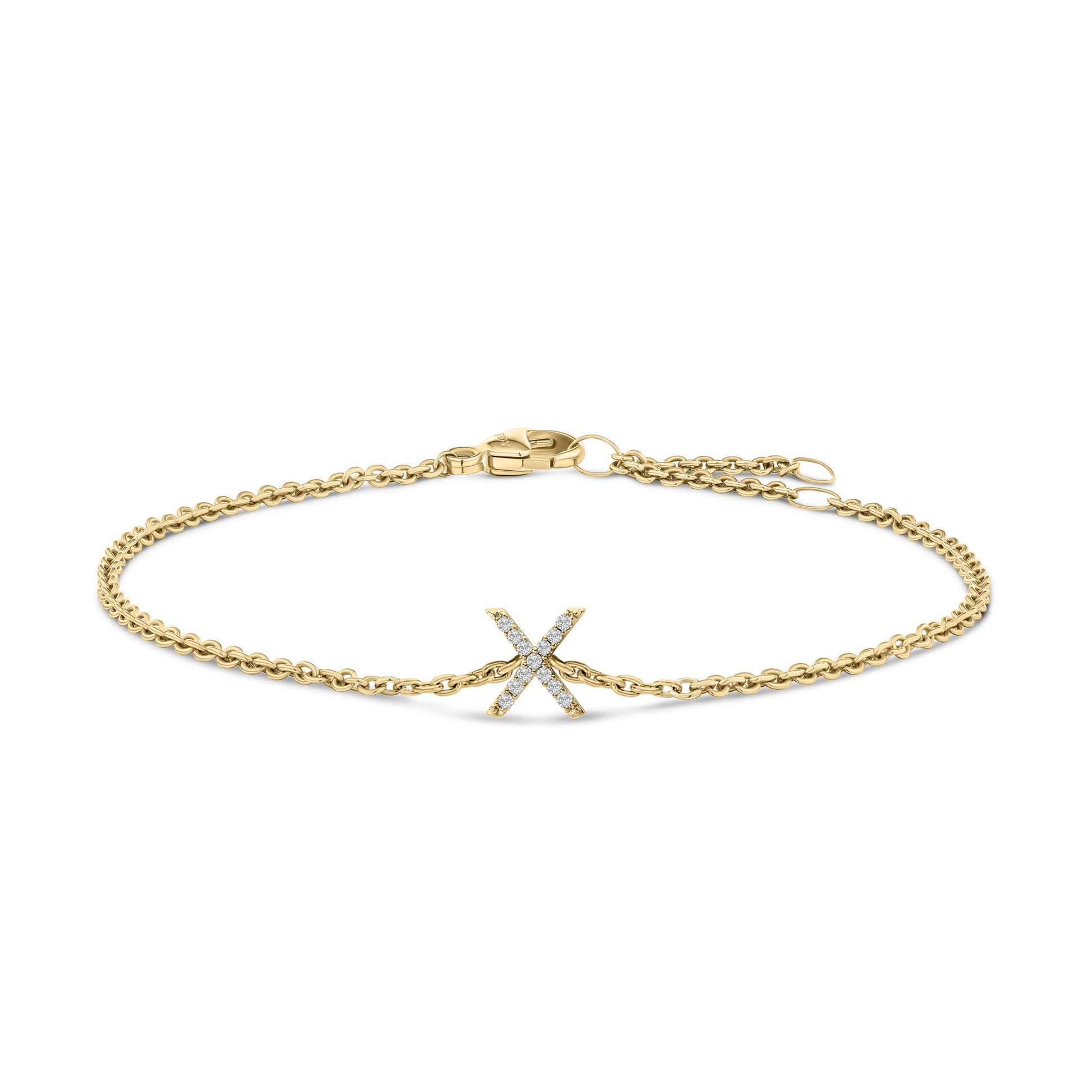 Yellow metal bracelet with an 'X' shaped centerpiece set with small white gemstones in micro-pave style, shown flat on a white background, front view.