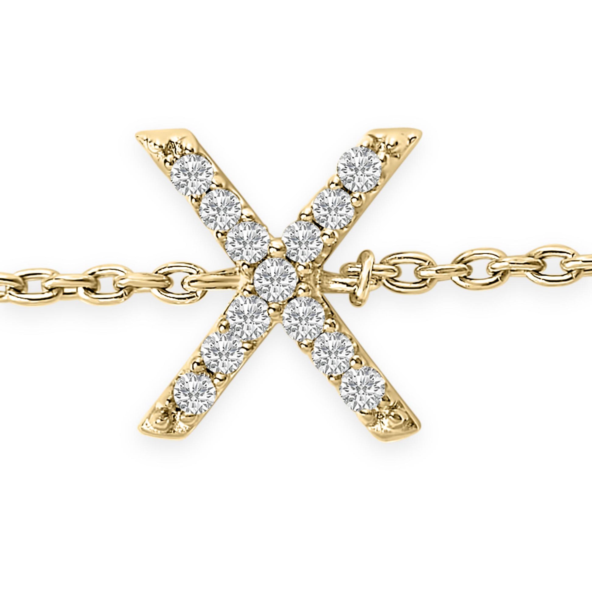 Close-up front view of a yellow metal bracelet featuring a cross-shaped charm adorned with round white gemstones in a micro-pave setting.