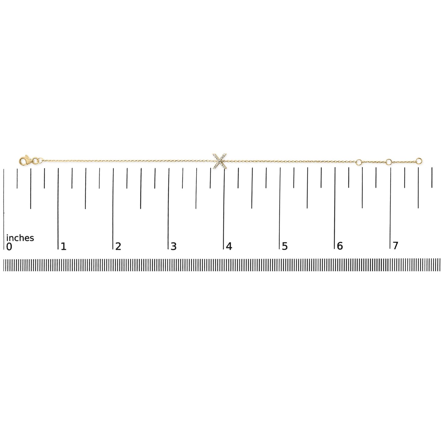 Yellow bracelet with an 'X' shaped centerpiece adorned with small white gemstones in a micro-pave setting, shown flat on a scale from a top-down angle.