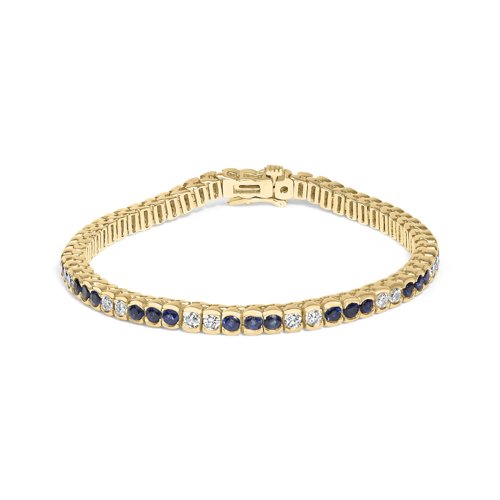 Yellow metal bracelet with alternating round blue and white gemstones in bezel settings, shown from a slightly angled top view.