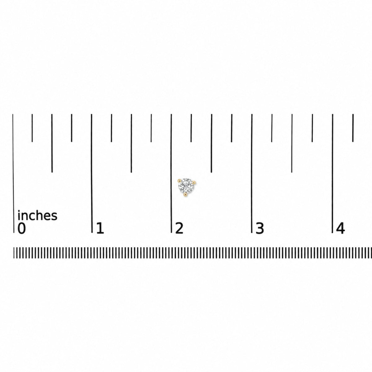 Close-up front view of a single yellow metal stud earring with a round white gemstone in a three-prong setting, shown on a ruler scale.