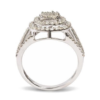 Close-up front angle of a white metal ring with a tiered square top, adorned with multiple round white gemstones in prong settings along the band and top.