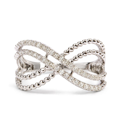 Close-up front angle of a white metal ring with intertwined bands, featuring round white gemstones in a prong setting and smooth rounded metal beads.