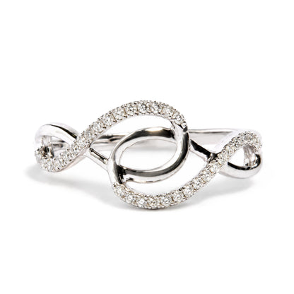 Close-up front angle of a white metal ring featuring intertwined loops adorned with round white gemstones in prong settings.