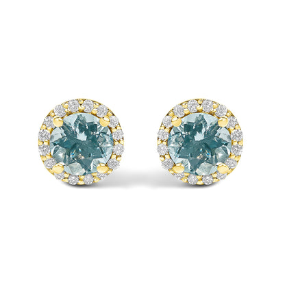 Pair of yellow metal stud earrings with round blue gemstones in the center, surrounded by a circle of small white gemstones, shown from the front against a white background.