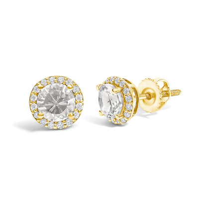 Pair of yellow metal stud earrings with round white gemstones in four-prong settings at the center, surrounded by smaller round white gemstones in shared prong settings, shown in a front and side angle on a white background.