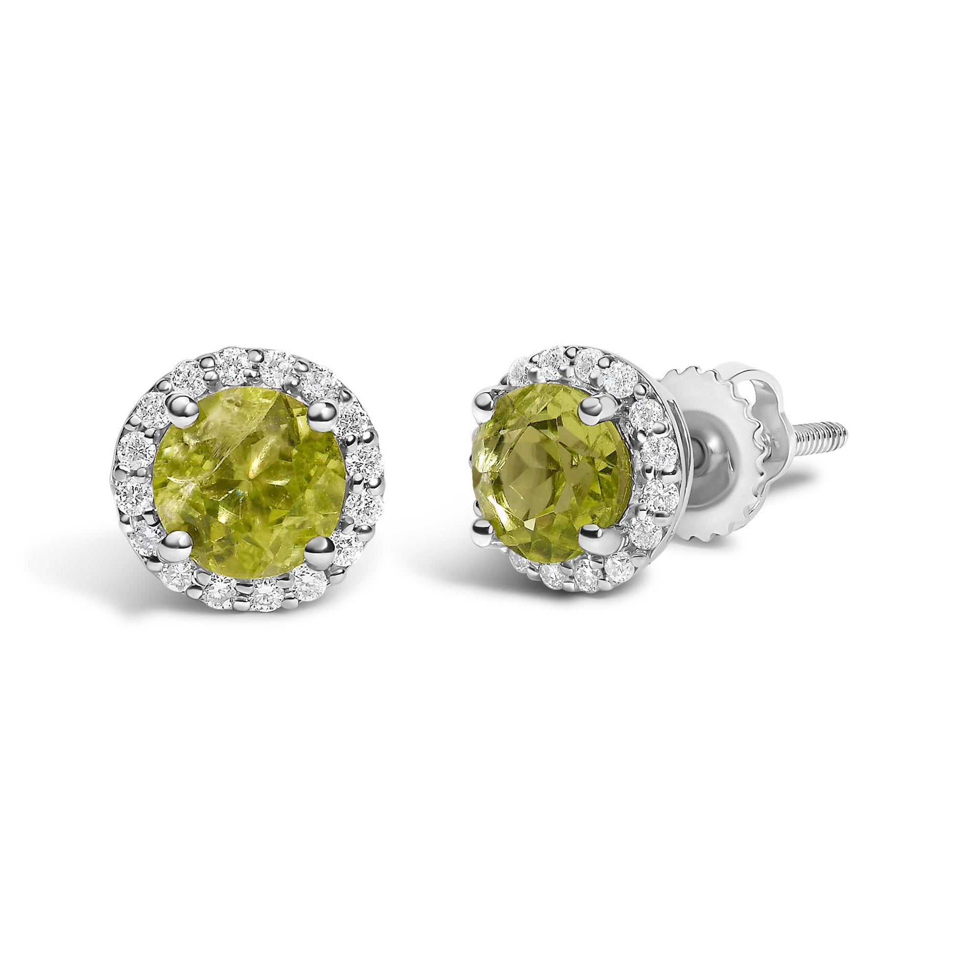 Pair of white metal stud earrings with round green gemstones in the center, surrounded by a circle of small white gemstones, shown from a front side angle on a white background.