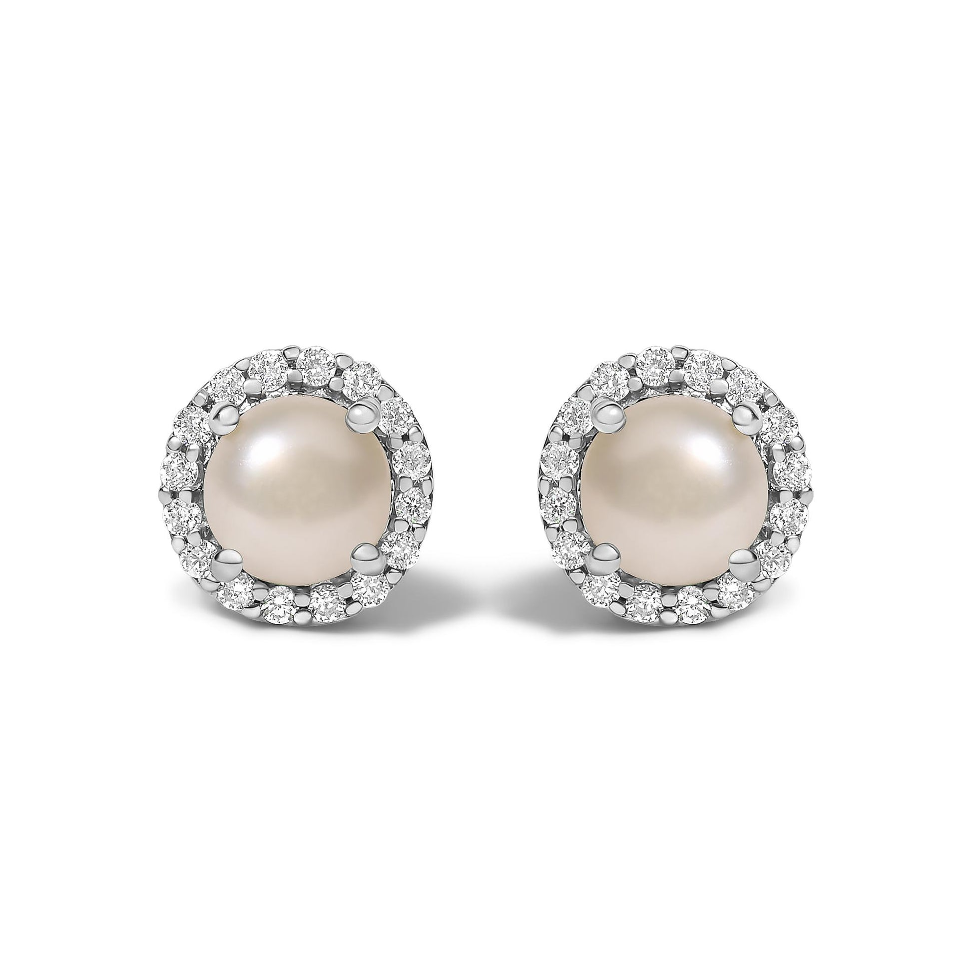 Pair of round stud earrings shown from the front on a white background, each featuring a central pearl surrounded by a halo of white round gemstones in shared prong settings on white metal.