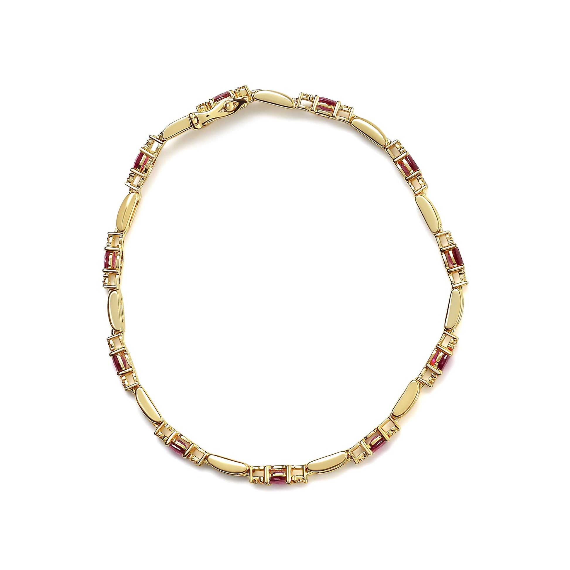 Top-down view of a yellow metal bracelet with alternating oval red gemstones and smooth metal links, accented with small white round gemstones in prong settings.