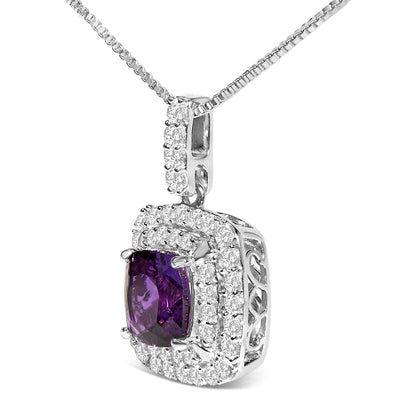 Close-up front angle of a white metal pendant necklace featuring a cushion-shaped purple gemstone center surrounded by two rows of small round white gemstones in prong settings.