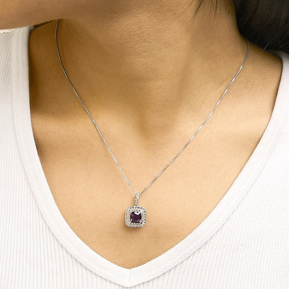White metal necklace set shown worn on a model featuring a cushion-shaped purple gemstone pendant surrounded by small white round gemstones, photographed from the front.