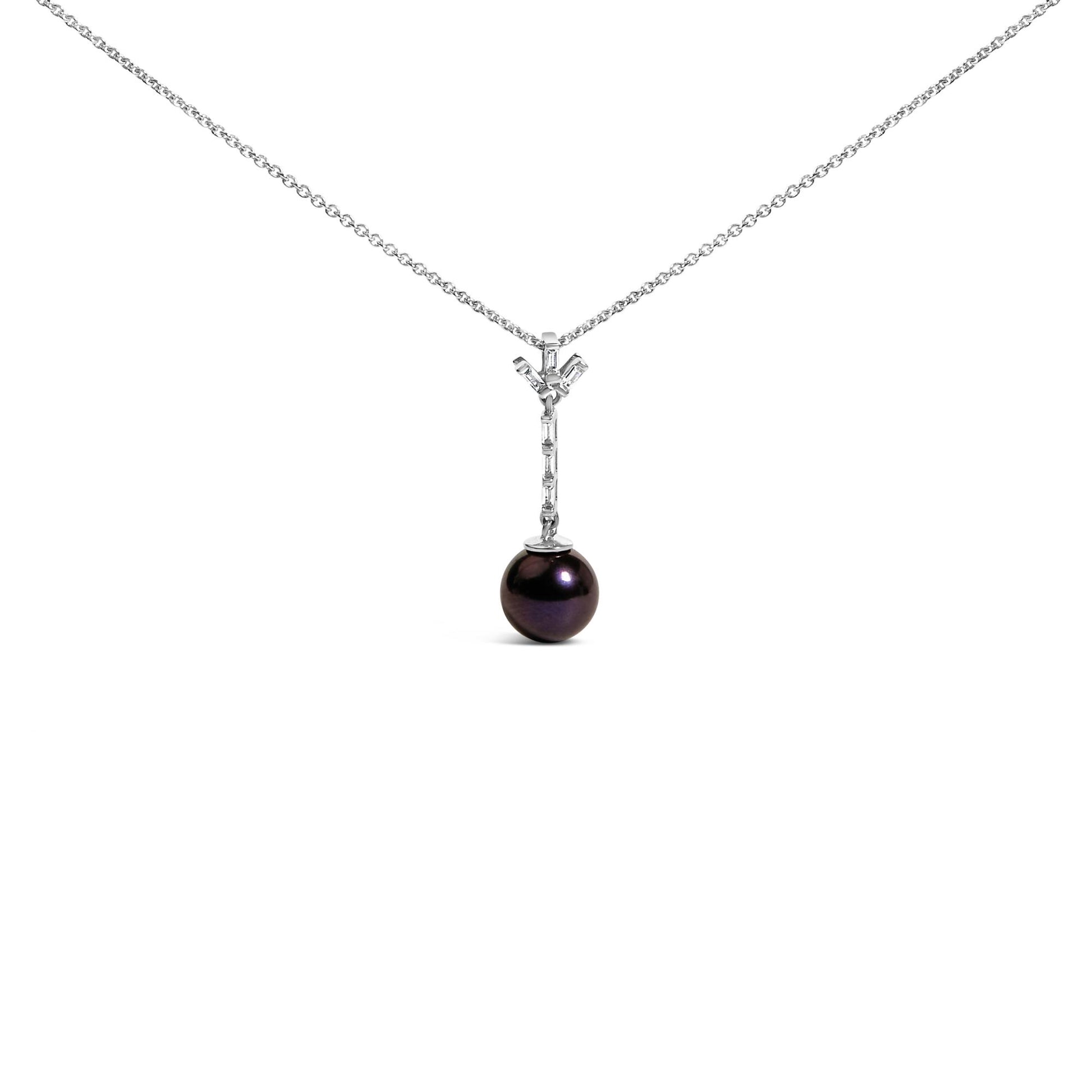 White metal necklace shown from the front with a vertical bar pendant set with white baguette-shaped gemstones in a channel setting, ending with a dark round gemstone drop.