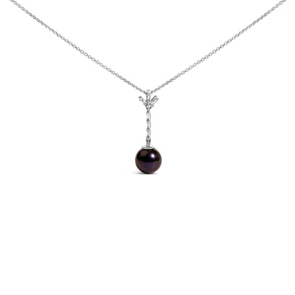White metal necklace shown from the front with a vertical bar pendant set with white baguette-shaped gemstones in a channel setting, ending with a dark round gemstone drop.