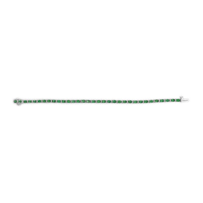White metal bracelet with a single row of alternating green oval gemstones and white round gemstones, shown flat on a white background from a top-down angle.