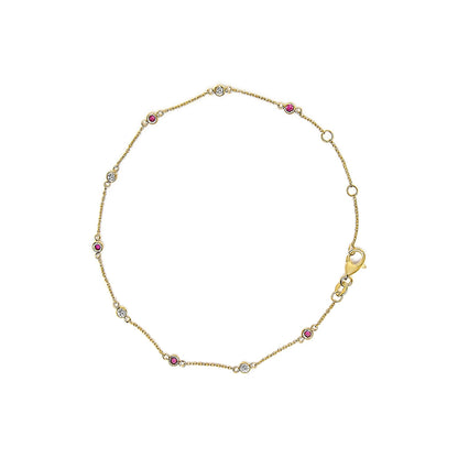 Top-down view of a yellow bracelet with alternating round white and red gemstones in bezel settings along a delicate chain and a lobster clasp.