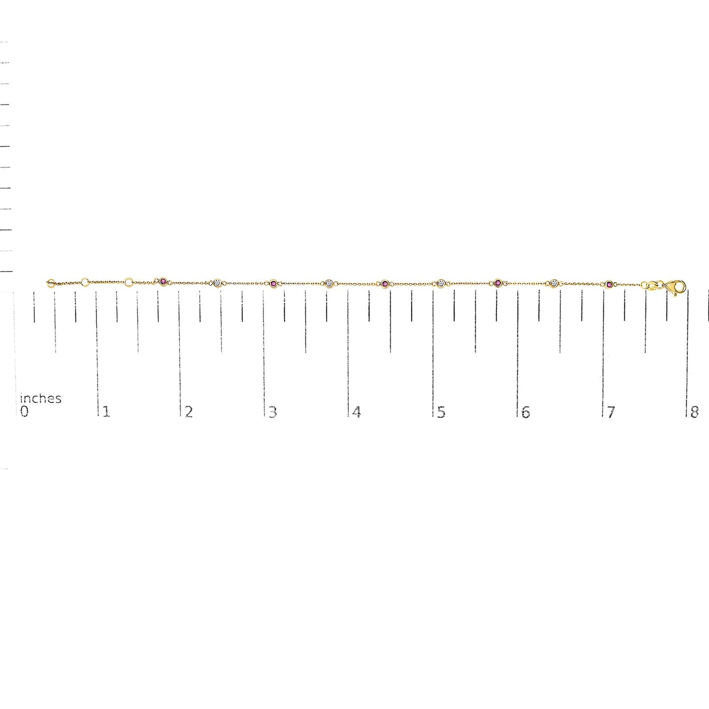 Yellow bracelet with alternating round white and red gemstones in bezel settings, displayed flat on a ruler for size reference, top-down angle.