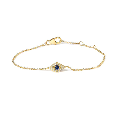 Yellow bracelet with a central diamond-shaped element featuring a round blue gemstone surrounded by small white gemstones, shown in a flat close-up view.