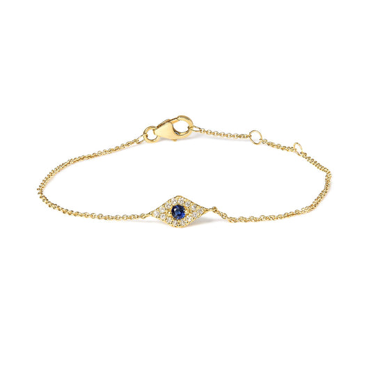 Yellow bracelet with a central diamond-shaped element featuring a round blue gemstone surrounded by small white gemstones, shown in a flat close-up view.