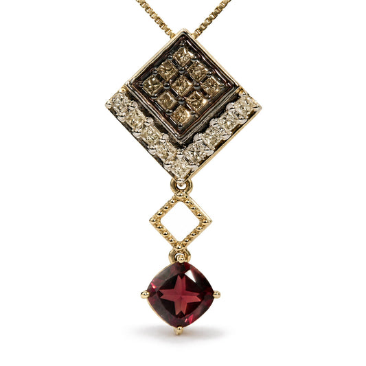 Front view of 10K yellow gold lab-created red cushion garnet and diamond drop pendant necklace with geometric pendant