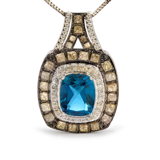 Close-up front view of a white metal pendant necklace featuring a large blue cushion-shaped gemstone in the center, surrounded by rows of champagne and white square-shaped gemstones in prong settings.