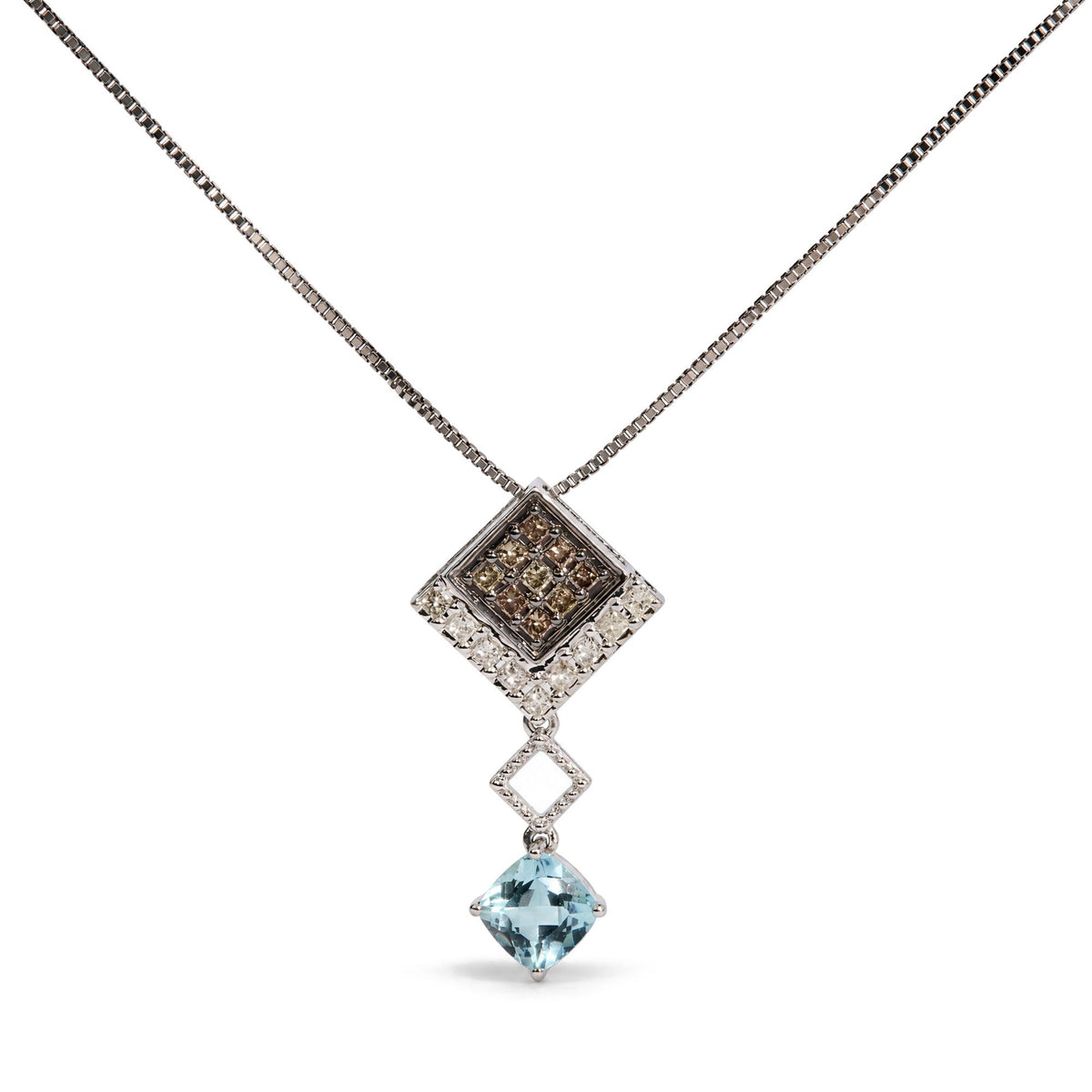 Close-up front view of a white metal necklace featuring a square pendant with two rows of champagne-colored princess-shaped gemstones set in prongs, connected to a smaller open diamond-shaped link, and finished with a large blue cushion-shaped gemstone in a four-prong setting, shown on a white background.