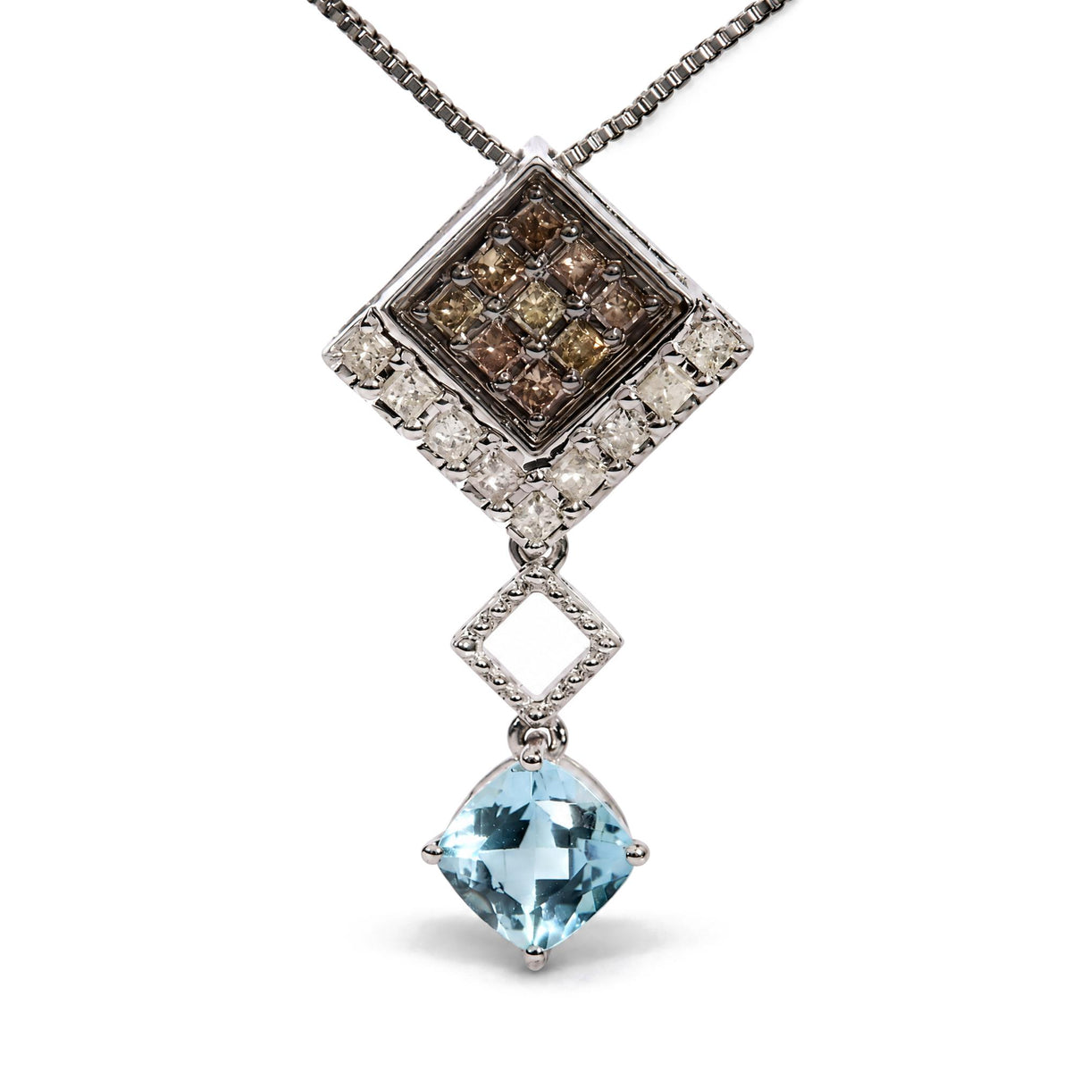 Close-up front view of a white metal necklace pendant featuring a square cluster of champagne-colored princess shape gemstones set in prongs, connected to a smaller open square link, and finished with a cushion-shaped blue gemstone in a four-prong setting.