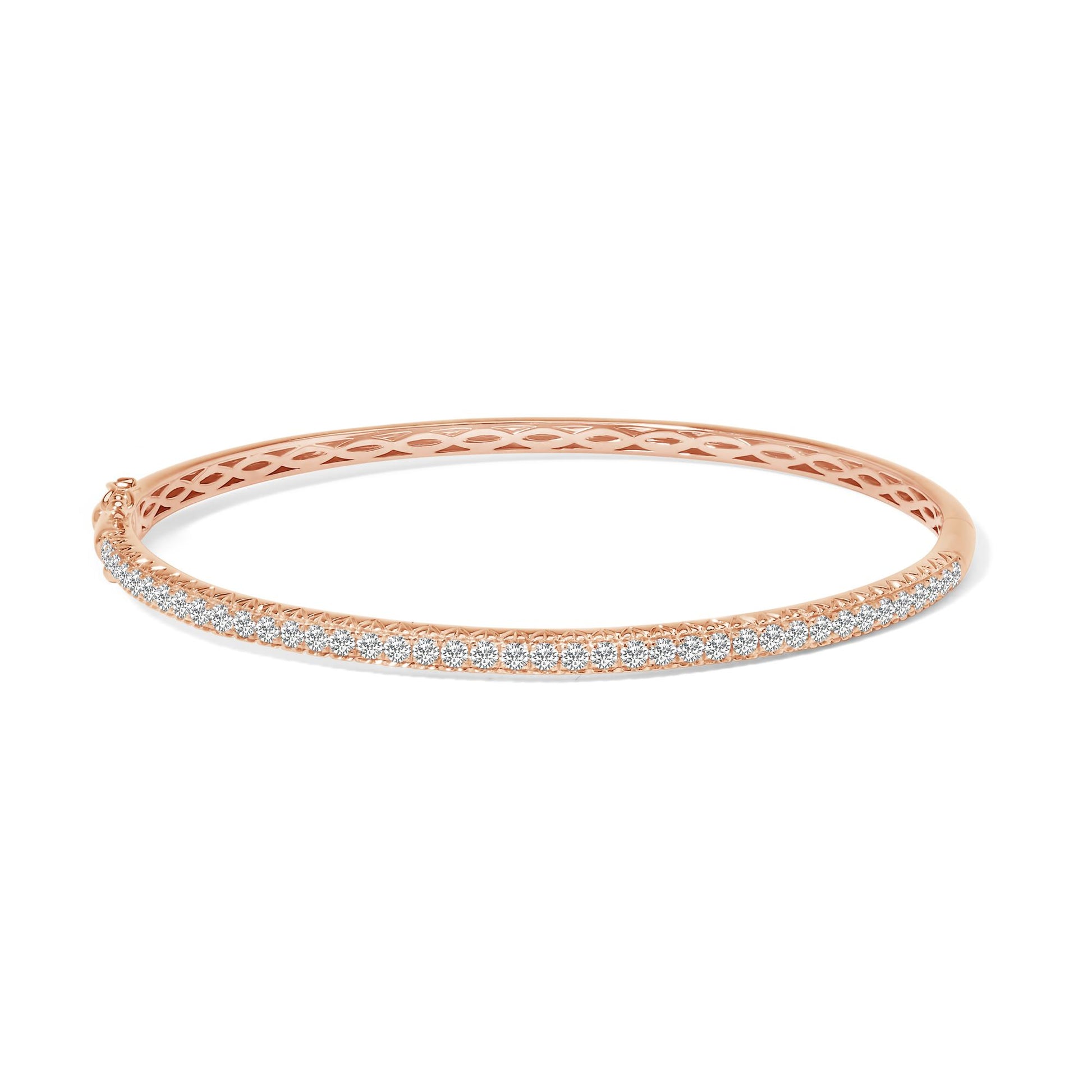 Rose metal bracelet with a row of white round gemstones in pave setting, shown from a side angle on a white background.