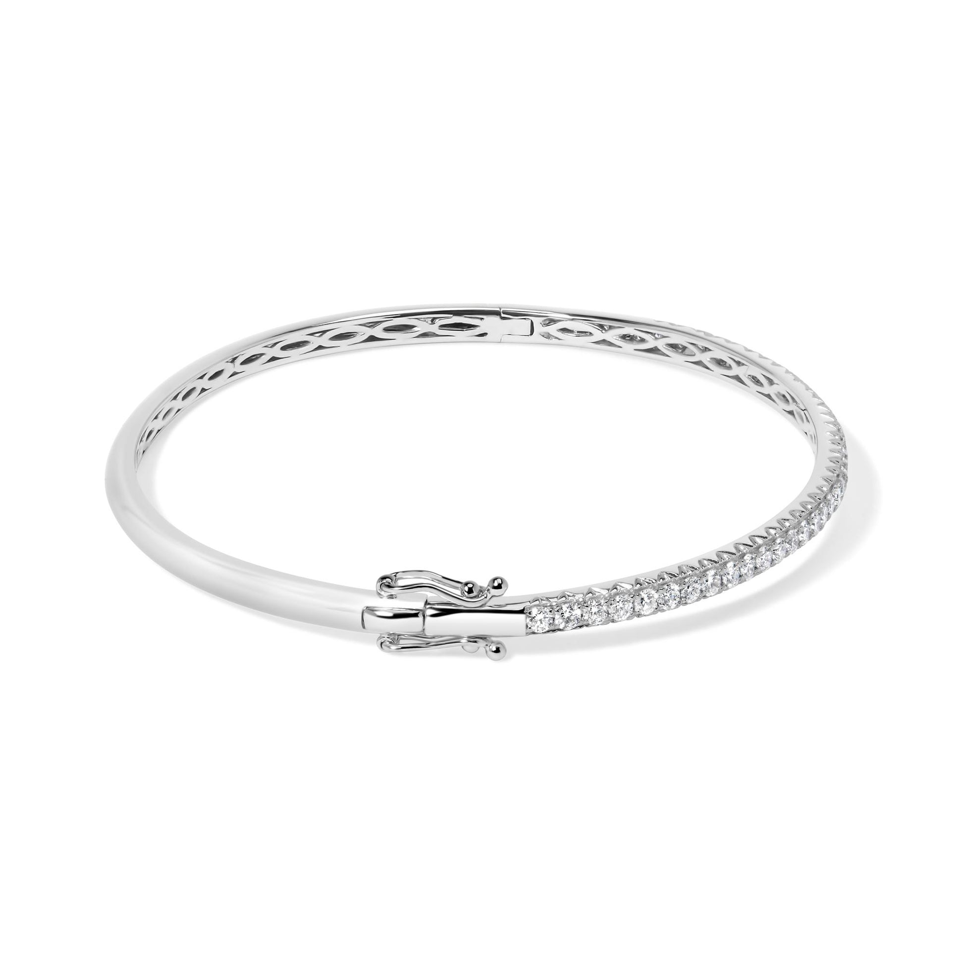 White metal bracelet with pave set round white gemstones along part of the band, shown from a front angle on a white background.