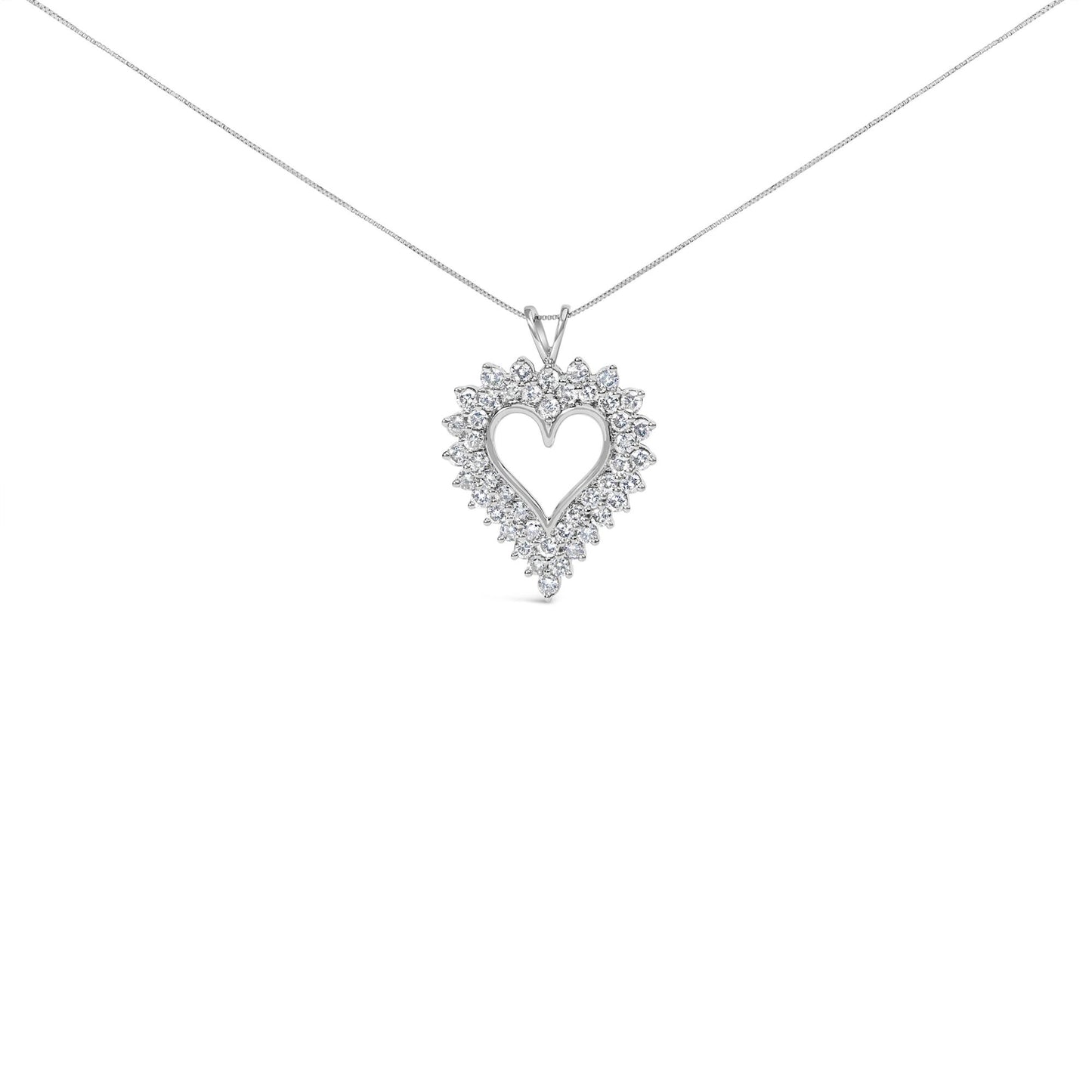 Front view of a white necklace with a heart-shaped pendant featuring prong-set round brownish gemstones.