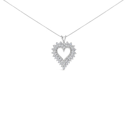Front view of a white necklace with a heart-shaped pendant featuring prong-set round brownish gemstones.