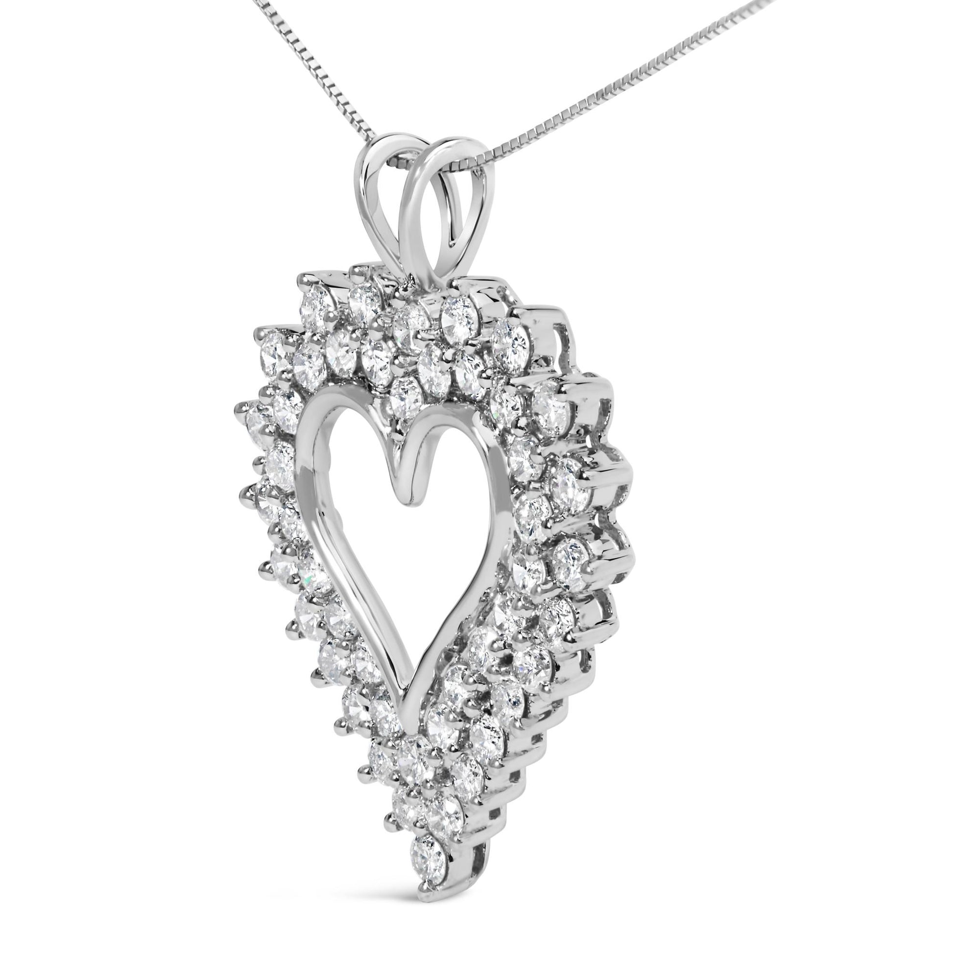 White metal heart-shaped pendant necklace with round prong-set white gemstones, shown in a close-up angled view.