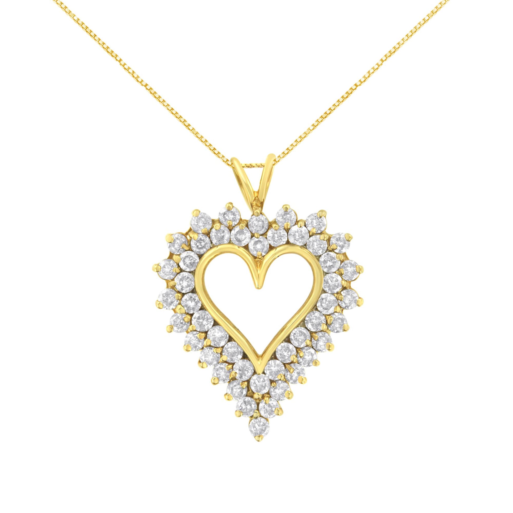 Front view of a yellow metal necklace with a heart-shaped pendant outlined with prong-set white gemstones.