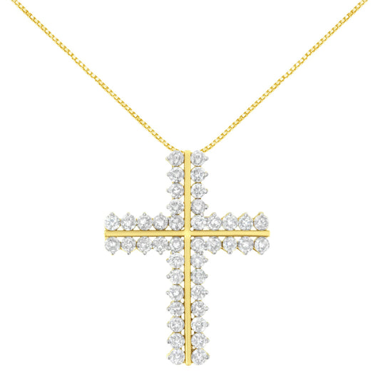 Front view of a yellow metal cross-shaped necklace pendant with round white gemstones in prong settings, suspended on a yellow chain.