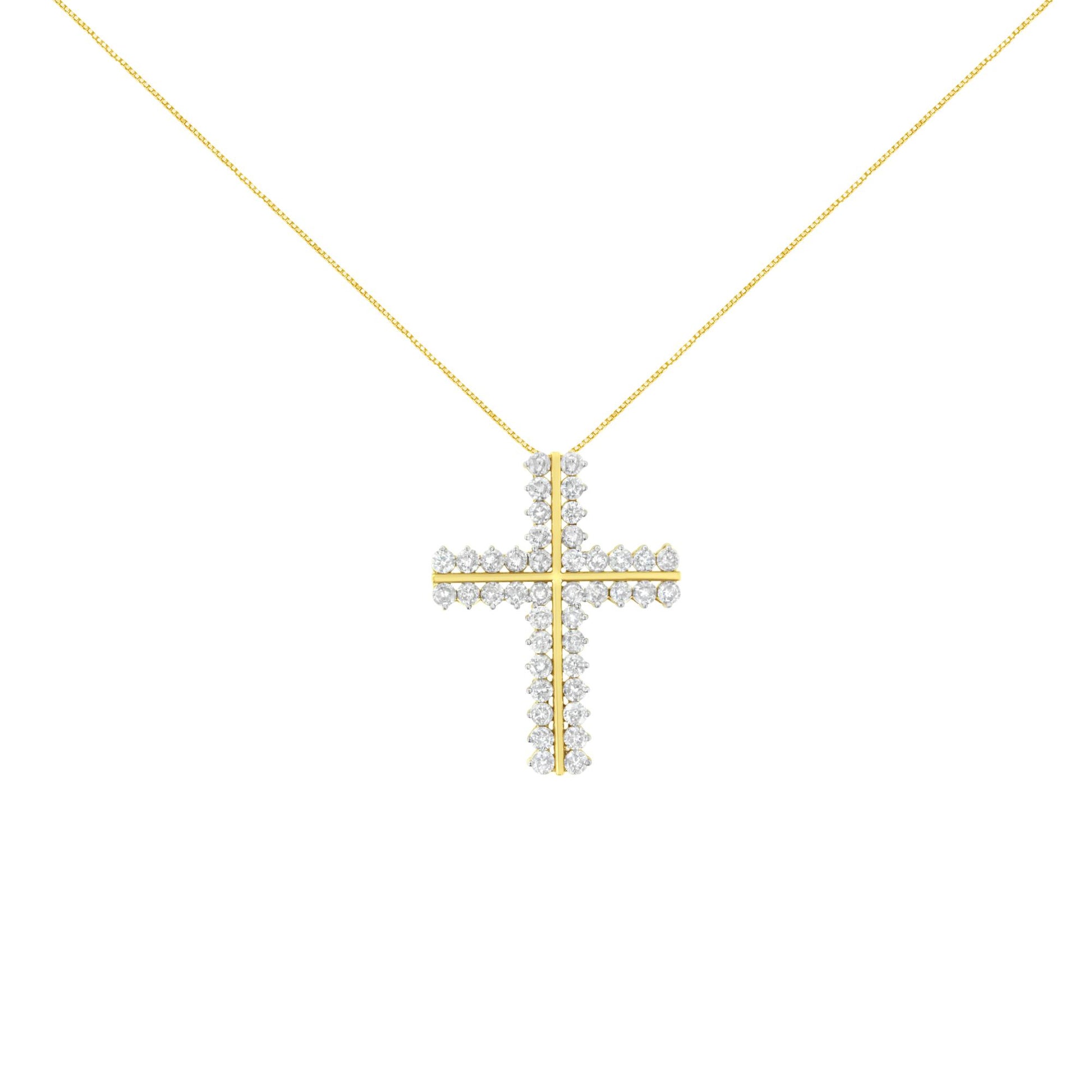 Front-facing view of a yellow metal cross-shaped necklace pendant adorned with round white gemstones in prong settings, suspended from a delicate chain.
