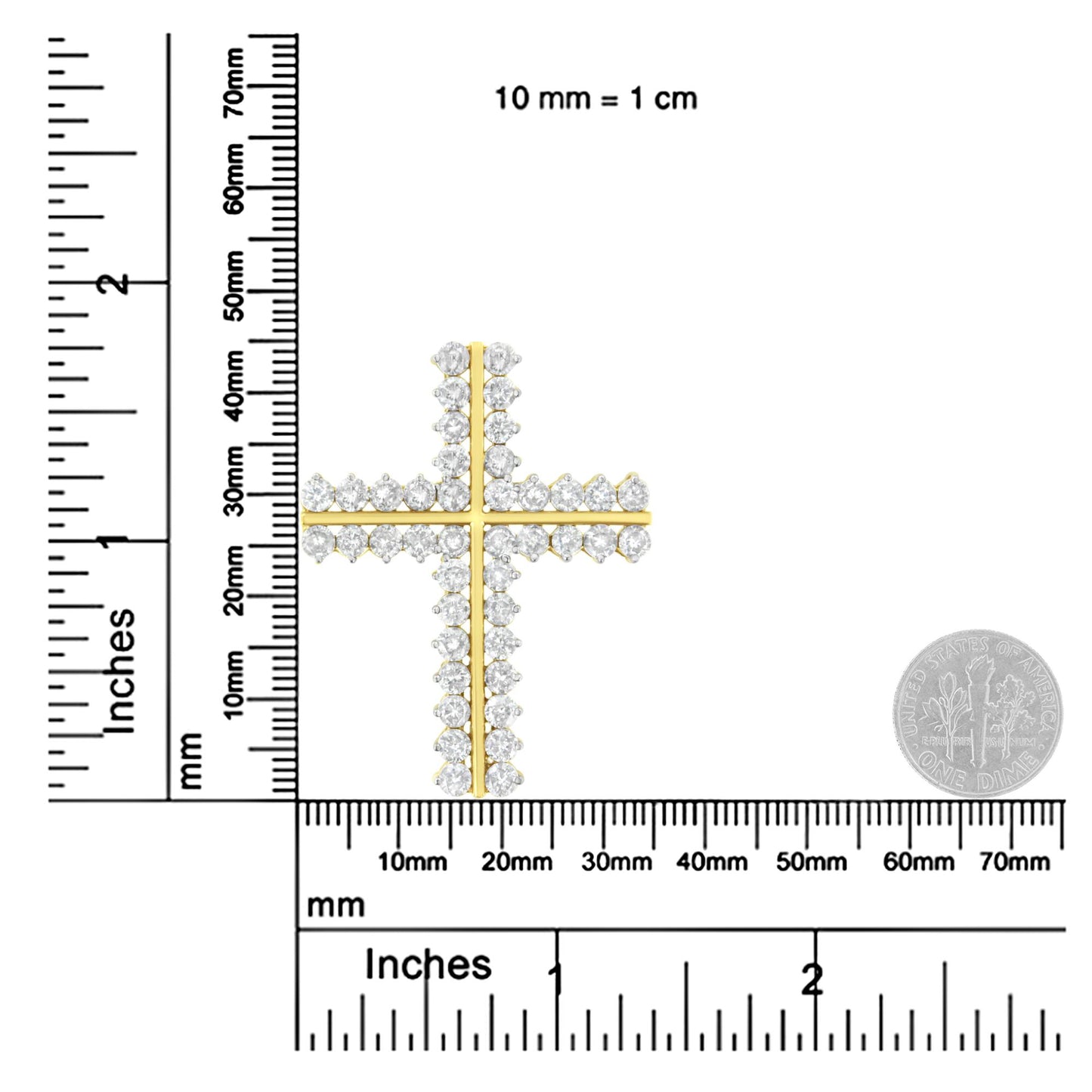 Close-up image of a yellow metal cross-shaped necklace pendant adorned with round white gemstones in prong settings, shown on a ruler and scale for size reference.