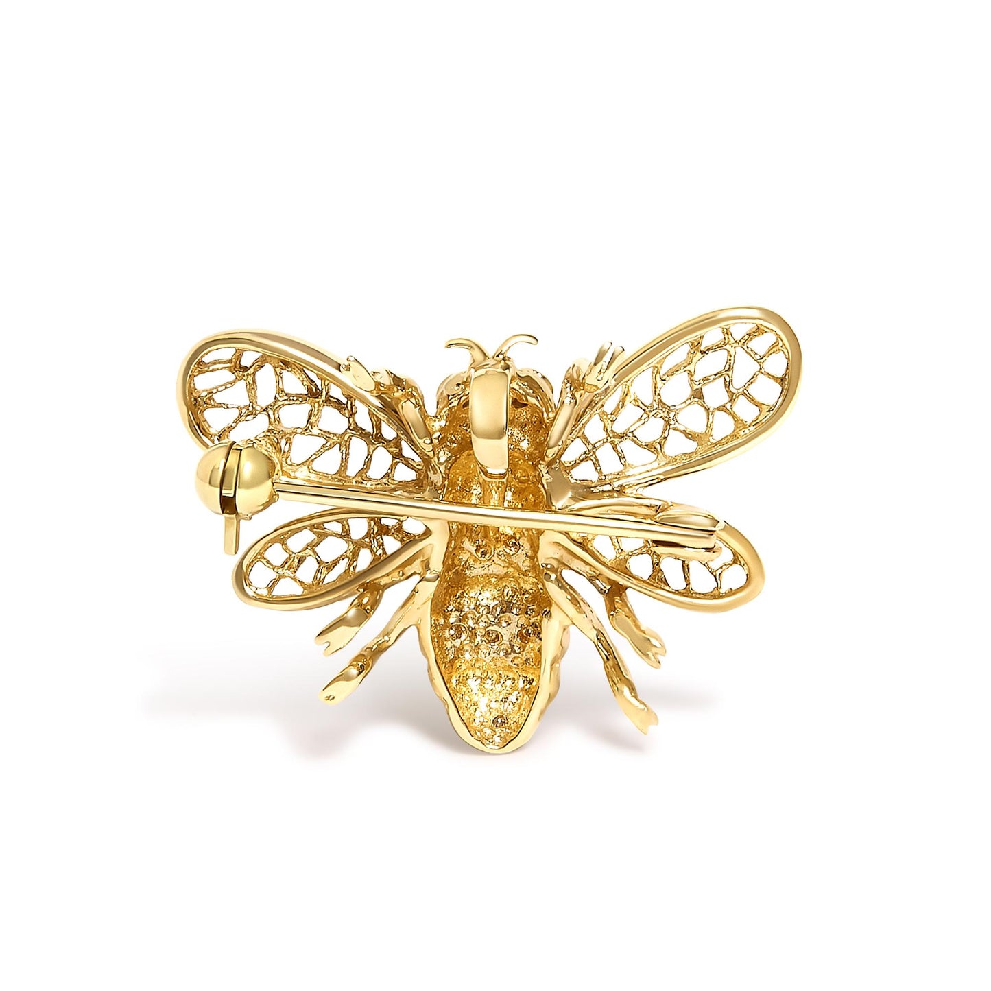 Close-up front angle of a yellow and white metal brooch shaped like a bee with openwork wings and round white gemstones on its body, shown on a white background.
