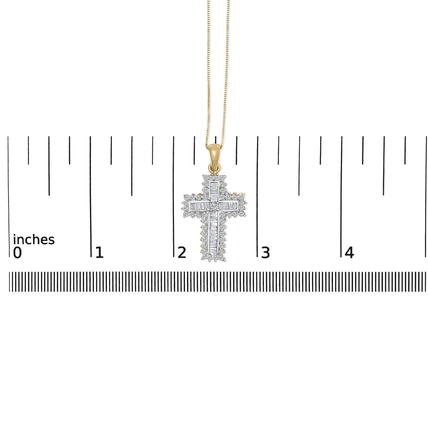 Yellow metal cross-shaped necklace with round and baguette white gemstones, shown hanging centered on a ruler for scale, front-facing angle.