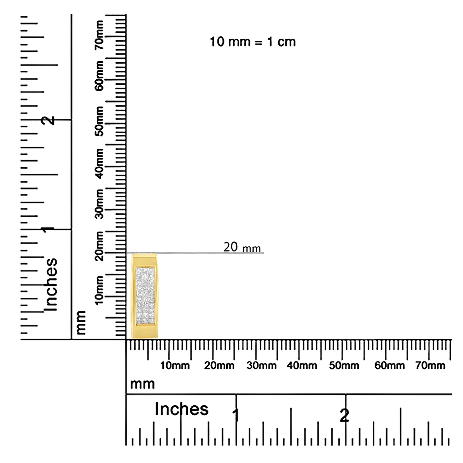 Close-up front view of a yellow necklace pendant inset with square white gemstones placed on a ruler for size reference.