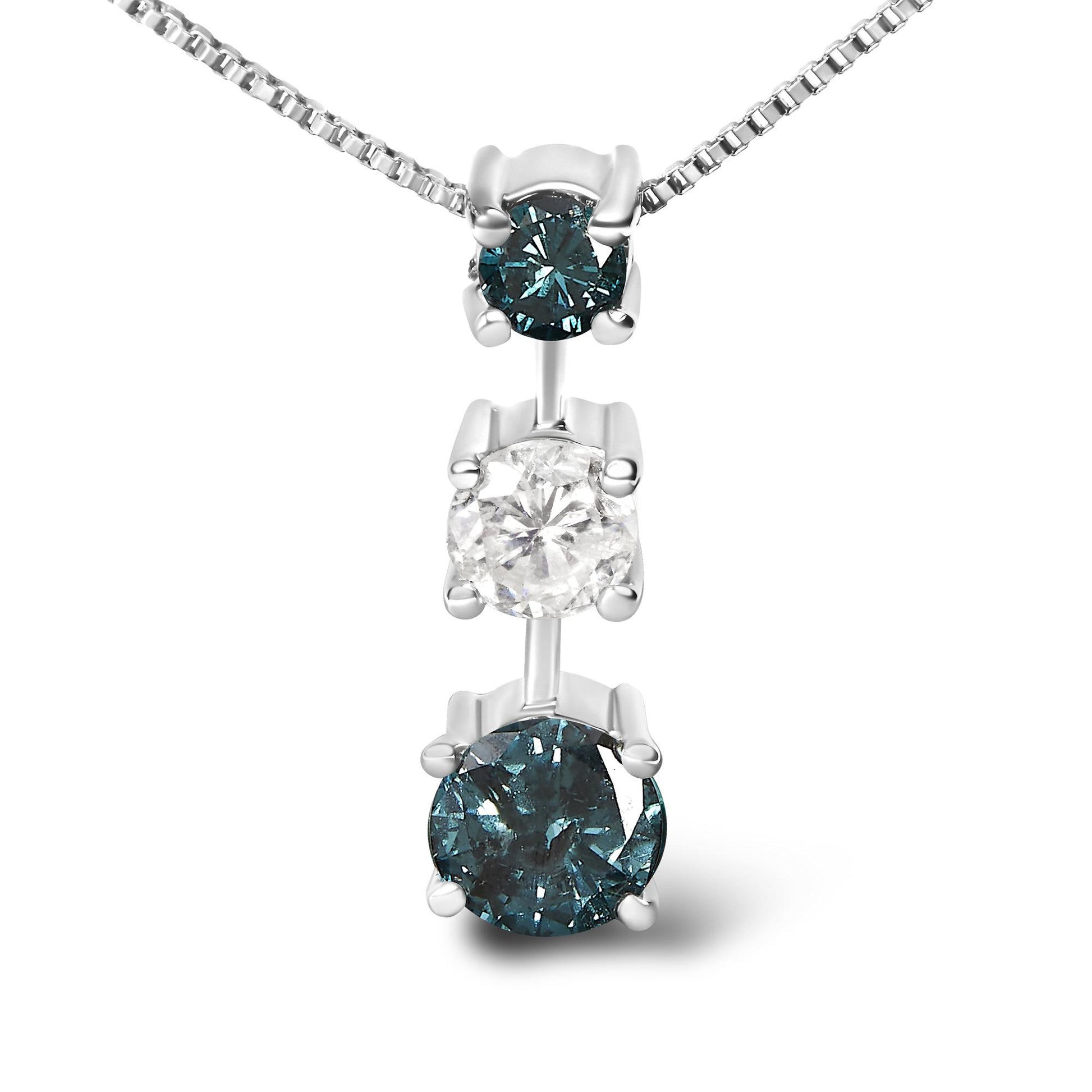 Close-up front view of a white metal necklace pendant featuring three round prong-set gemstones: one white gemstone in the center and two blue gemstones above and below it.