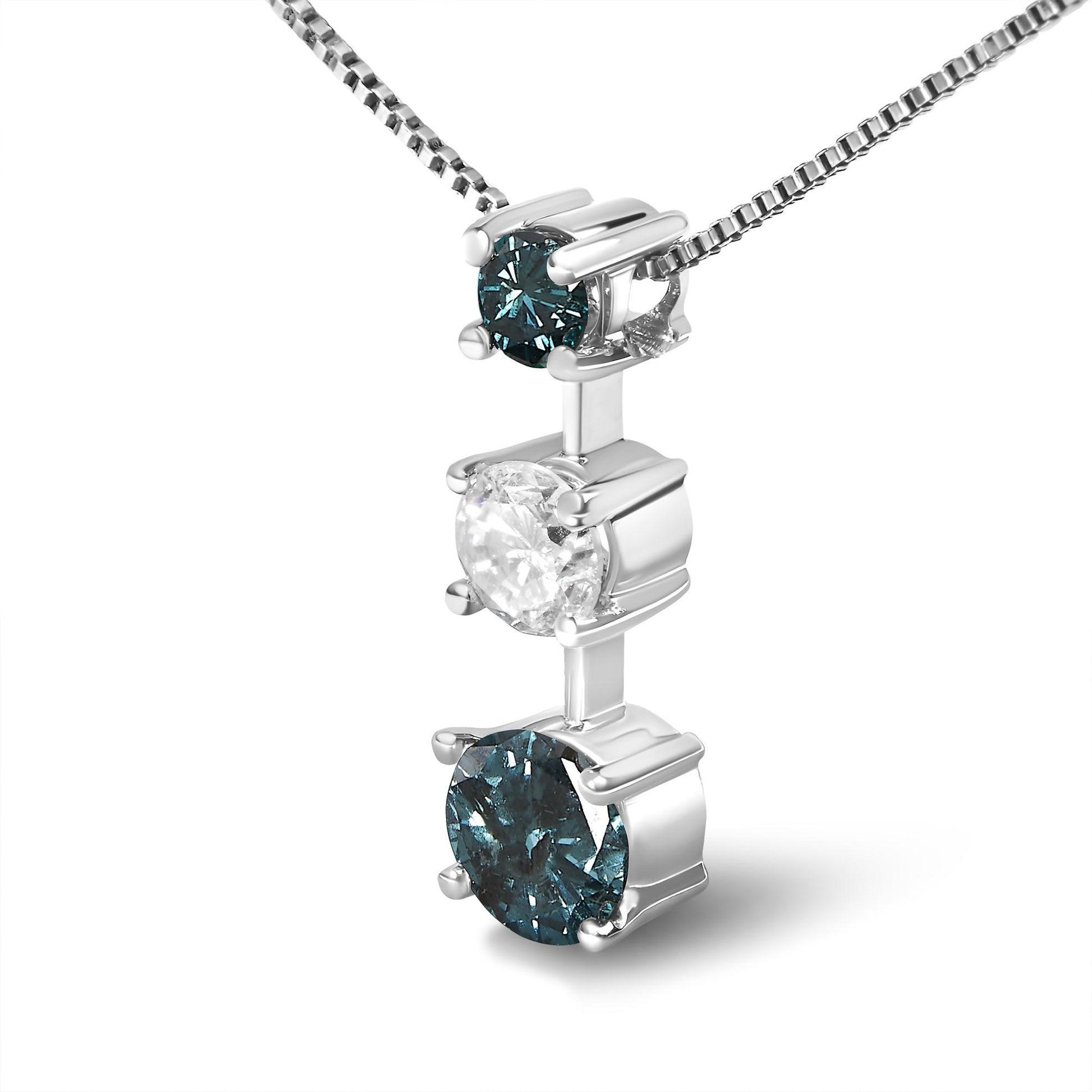 Close-up front angle of a white necklace pendant with a vertical design featuring two blue round gemstones and one white round gemstone, all in prong settings, on a box chain.