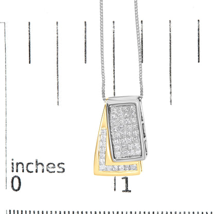 Close-up front view of a two-tone necklace pendant with yellow and white tones, featuring rectangular shapes adorned with white gemstones, photographed on a ruler for size reference.