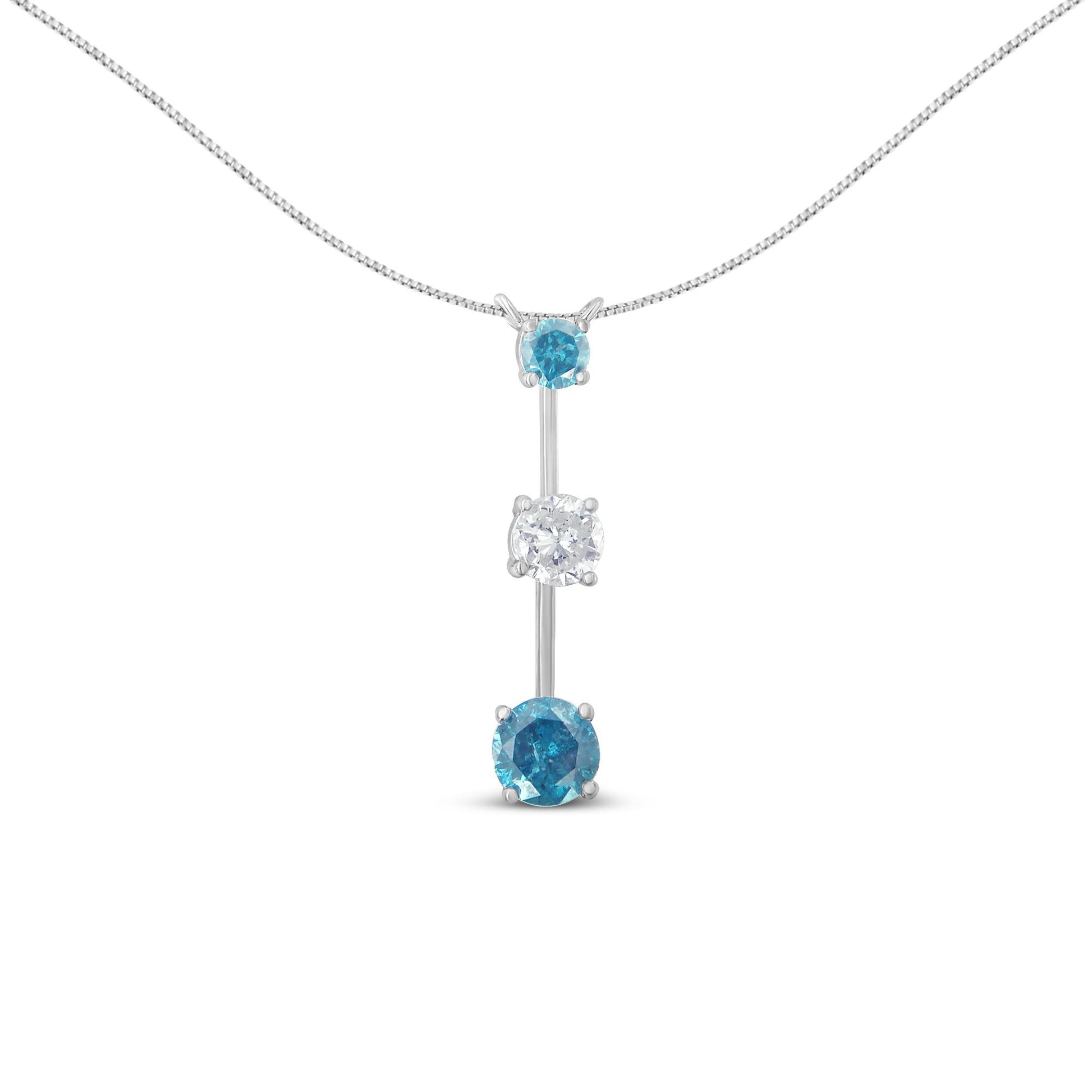 Front view of a white metal necklace with a vertical pendant featuring one white gemstone and two blue gemstones in prong settings.