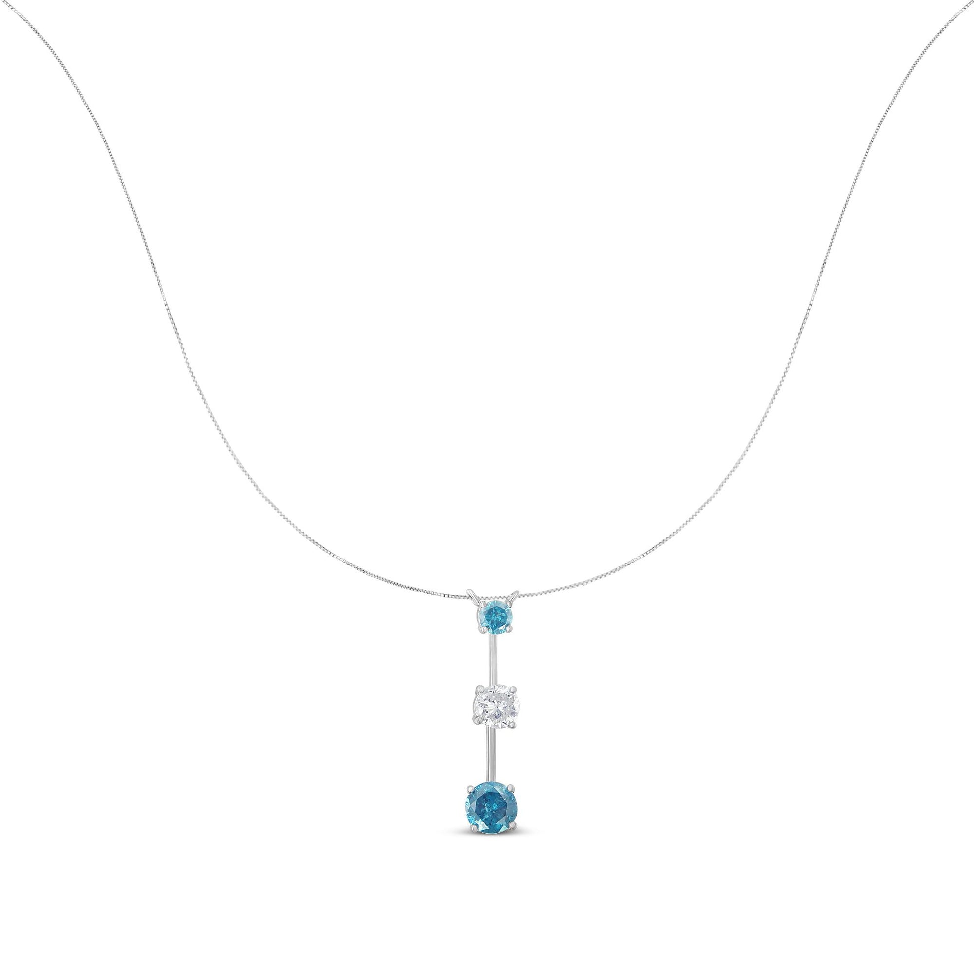 Front view of a white metal necklace with a vertical pendant featuring one white round gemstone between two blue round gemstones, all in prong settings.