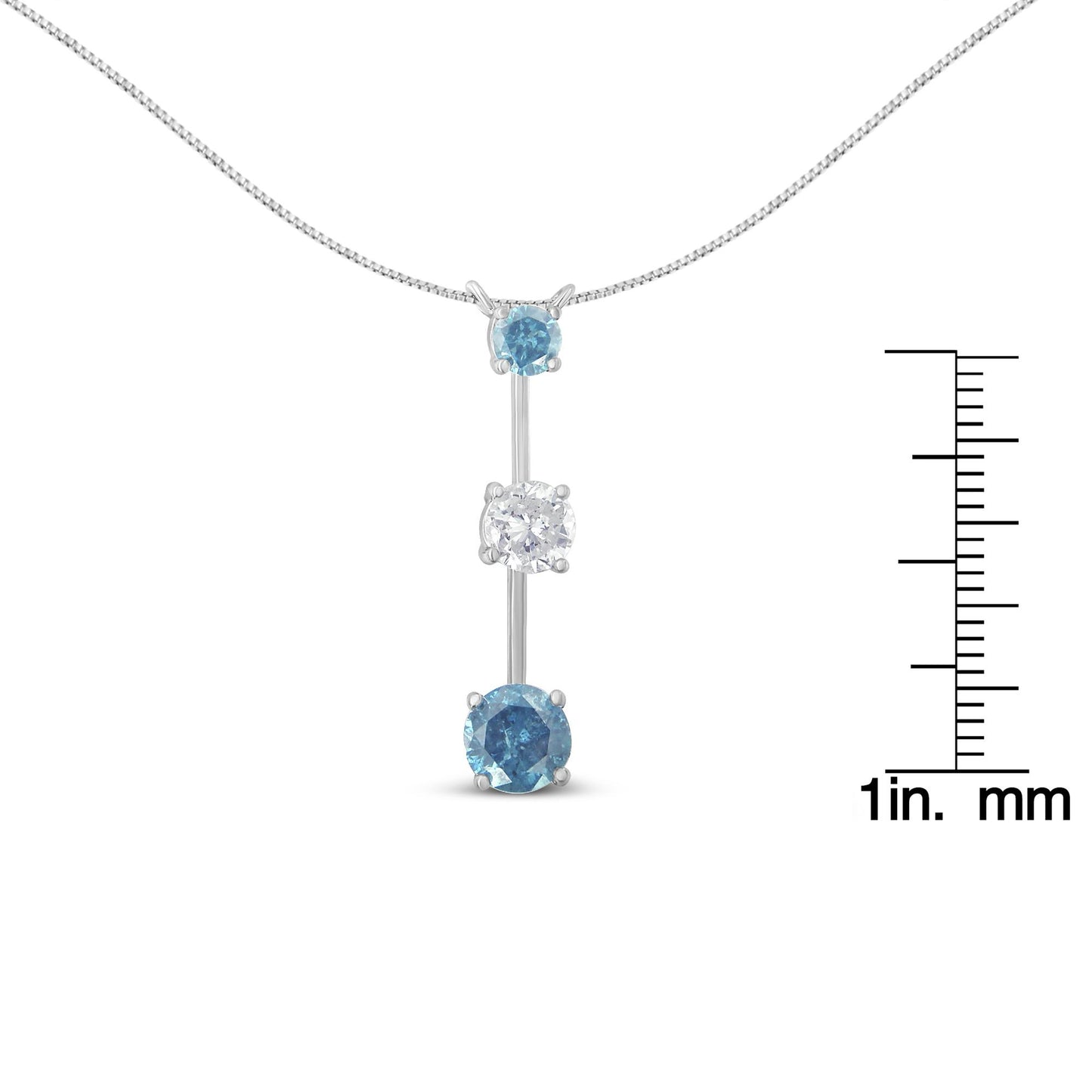 White metal necklace with a vertical pendant featuring one white gemstone between two blue gemstones, shown from the front with a ruler for size reference.