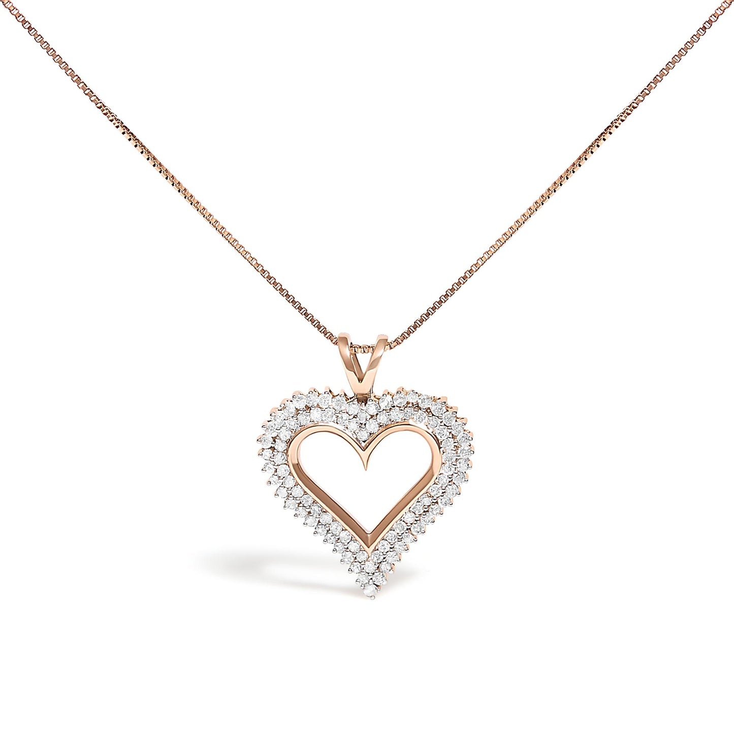 Front view of a rose metal heart-shaped necklace pendant outlined with round white gemstones in prong setting, against a white background.