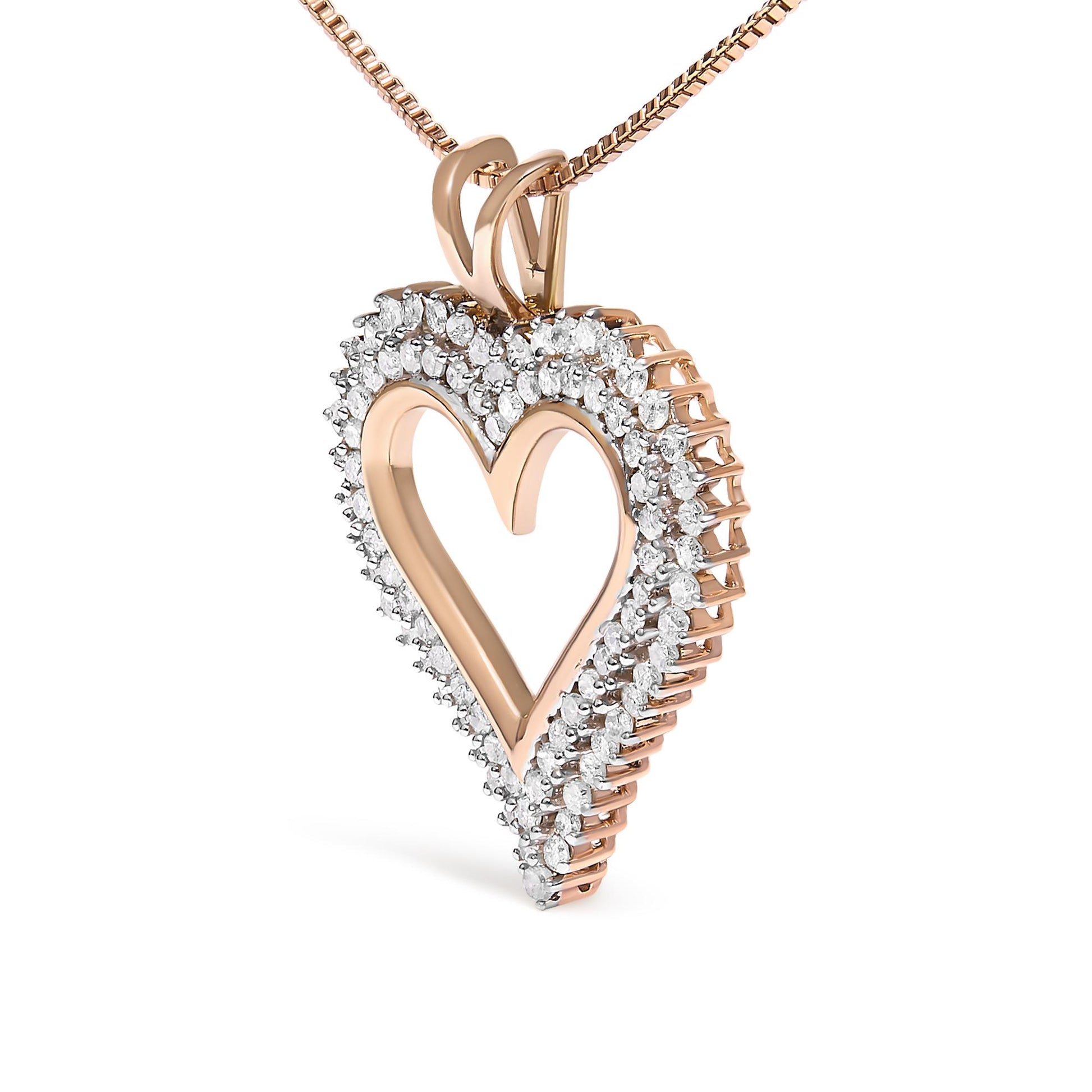 Close-up angled view of a rose-colored heart-shaped necklace pendant featuring two rows of round white gemstones in prong settings.