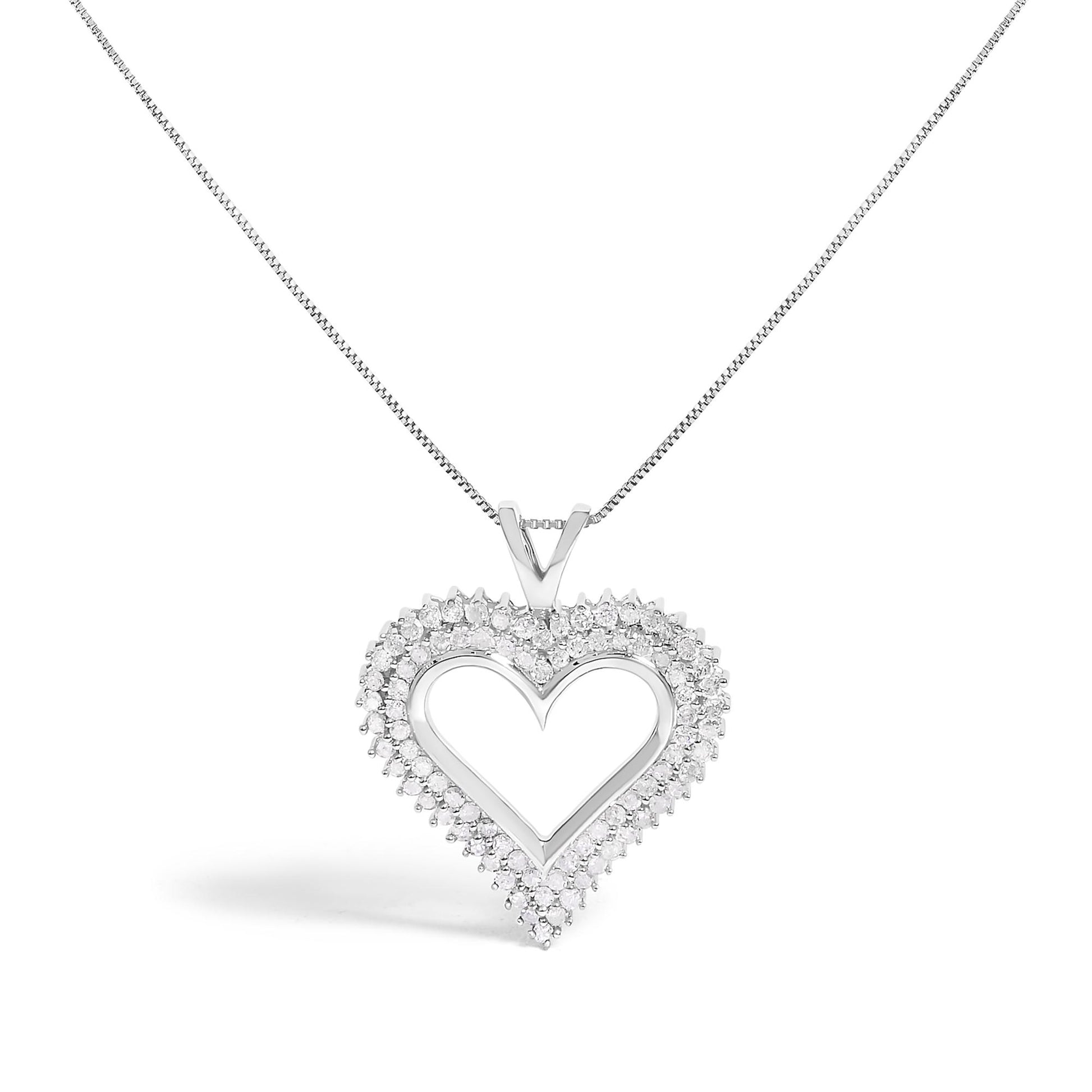 Front-facing view of a white metal heart-shaped pendant necklace with two rows of round white gemstones in prong settings along the outer heart edge.
