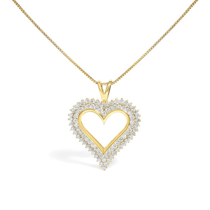 Front angle shot of a yellow metal heart-shaped necklace pendant outlined with round white gemstones and hanging from a yellow metal chain.